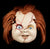 A picture of the face of Chucky,  a collectible horror figurine.
